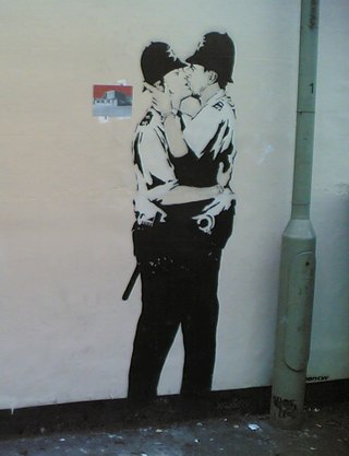 <i>Kissing Coppers</i> Artwork by Banksy