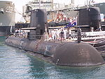 HMAS Sheenan (front left), one other submarine, HMAS Sirius (back left) and ex-HMAS Westralia at HMAS Stirling in 2006