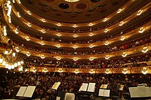 The auditorium, with several balconies, seen from the orchestra