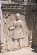 A relief of a Qajar soldier on one of the walls of the mansion