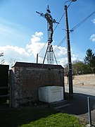 Croix de mission de 1882, dans le village.