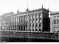 The same building in 1925, showing southward expansion (left);[12] the building was destroyed during World War II