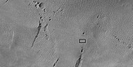 Close view of pits, as seen by HiRISE under HIWish program. The box shows the size of the pits. Some pits are as wide as a football field is long.