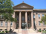 Bronze statue of two standing men