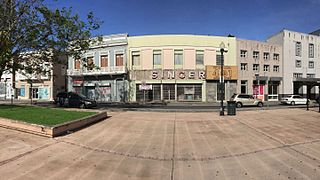 Historic buildings and TU Río Piedras station entrance in Plaza La Convalecencia across Ponce de León Ave.