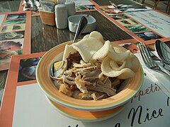 Bubur ayam disajikan di Solo, Jawa Tengah.