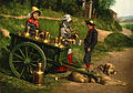 An 1890s photochrom before restoration. Note the imperfect alignment of coloration for the hillside pathway in the background at far right and large areas if red dye drips beneath the cart and surrounding the boy, also the mottled and blotchy tone of overall coloration. These are common flaws to the photochrom process.