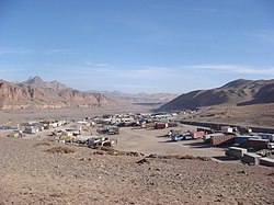 Trucks waiting to cross into China in the village of Erkeshtam