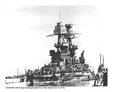 USS Nevada entering drydock 2 at Pearl Harbor, Feb 18, 1942. (00cb6f4d-1dd8-b71b-0b5a-44c7863ac5de).jpg