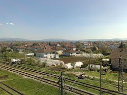 A photo of a part of the railway and the houses near it