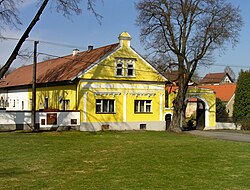 Farmhouse in village's center