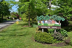 The Washington Grove welcome sign