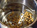 Boiling roasted corn kernels