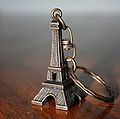 Being a major attraction, the Eiffel Tower is reproduced in miniature for tourists, as keychains for example.