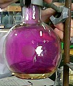 Round bottom flask filled with violet iodine vapor