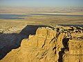 * Nomination: Aerial view of Masada and the border with Jordan. --Godot13 21:34, 24 April 2013 (UTC) * Review Tilted clockwise, bit unsharp. Mattbuck 12:04, 2 May 2013 (UTC) Lightly sharpened. Unable to see tilt- vertical alignment on walkway handrails, terrace columns, as well as electrical towers in distance--Godot13 16:39, 2 May 2013 (UTC)