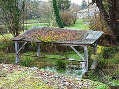 Lavoir sur la Maligne, en amont du bourg.