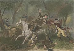 A wounded British officer falls from his horse after being struck by gunfire; another British officer to his rights puts his hands fowards to support the wounded rider; troops skirmish in the background; men lie dead at the riders feet.