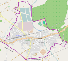 Mapa konturowa Opalenicy, blisko centrum na dole znajduje się punkt z opisem „Parafia św. Józefa”