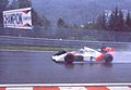 1989: Weltmeister Alain Prost auf McLaren im Regen von Spa-Francorchamps