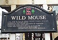 The older rides have historical plaques like this one on Wild Mouse.