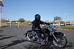 Thumbnail for File:Man Exiting on Custom Harley-Davidson - Las Vegas Ride for Kids 2019.jpg