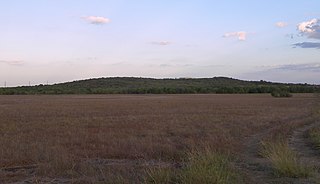 <span class="mw-page-title-main">Pilot Knob (Austin, Texas)</span> Eroded core of an extinct volcano located 8 miles (13 km) south of central Austin, Texas