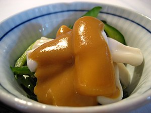 Miso on cucumber and squid salad