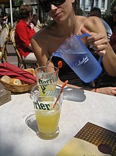 The French soft drink citron presse, being diluted with water Citron presse.jpg