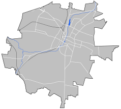 Mapa konturowa Kielc, blisko centrum u góry znajduje się punkt z opisem „Parafia Świętego Krzyża”