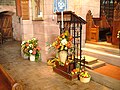 The lectern decorated for the 2007 Harvest Festival. "The Seed is the Word" on one of the copper plates can be made out