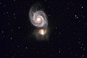 The Whirlpool Galaxy and NGC 5195. Several features can be seen. The three-pronged structure on the lower part of NGC 5195 is referred to as "The Crown", while several stellar streams extend towards the left. M51 Zoom.jpg