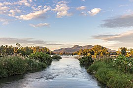 Mekong bank seen from the bridge between Don Det and Don Khon Laos at sunrise - Western view