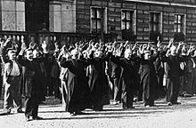 Bydgoszcz 1939 Polish priests and civilians at the Old Market.jpg