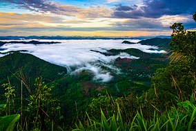 The sunrise seen from the top of Khao Thevada ("Angel Mountain"; 1,123 m, 3,684 ft)