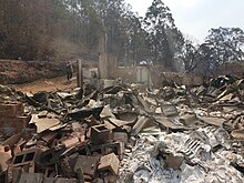 A house in Australia that was destroyed by wildfires Family home destroyed.jpg