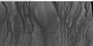Close-up of channels in gullies showing that the paths of the channels changed over time. This feature suggest formation by running water with a high load of sediment. Picture was taken with HiRISE under HiWish program. Location is the Mare Acidalium quadrangle. Note this is an enlargement of a previous image in Phaethontis quadrangle.