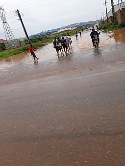 Flooded road at Namanve Industrial Park (March 2020) Flooded road Uganda.jpg