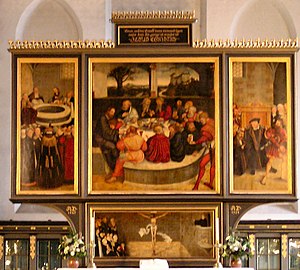 Cranach the Elder's Wittenberg Altarpiece. An early Lutheran work depicting leading Reformers as Apostles at the Last Supper. Wittenberg Stadtkirche Cranachalter.jpg