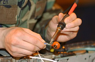 <span class="mw-page-title-main">Soldering</span> Process of joining metal pieces with heated filler metal