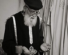 Fr. Anthony Praying during Lenten service