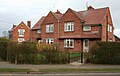 Semi-detached houses on Wilbraham Road. School House is in the background (left)