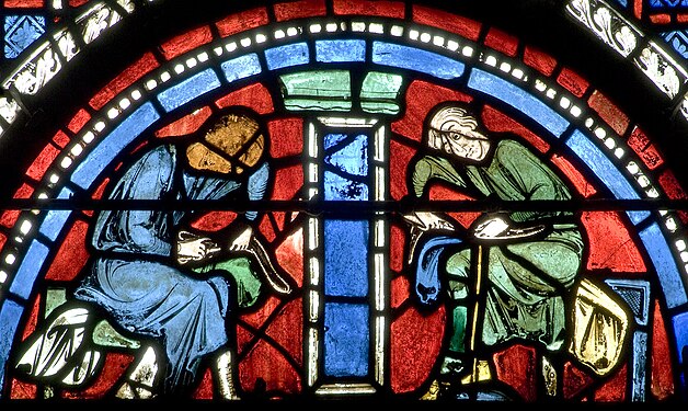 Shoemakers at work in the Good Samaritan window