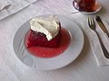 "Ekmek kadayıfı" with sour cherry sauce and "kaymak"