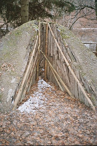 <span class="mw-page-title-main">Charcoal pile</span> Covered fire for producing charcoal