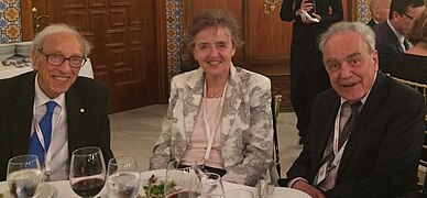 Nobel laureates Edmond Fischer (left) and Werner Arber (right) with Mrs. Arber.jpg