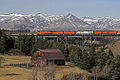 Spot Mountain seen with Two Medicine River train trestle