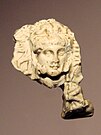 Alexander-Heracles head, Takht-i Sangin, Temple of the Oxus, 3rd century BCE.[48]