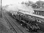 Down iron ore train passing in 1950