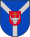 A coat of arms depicting a grey bull's head with a golden cross protruding from the top all on a red crest on a blue background